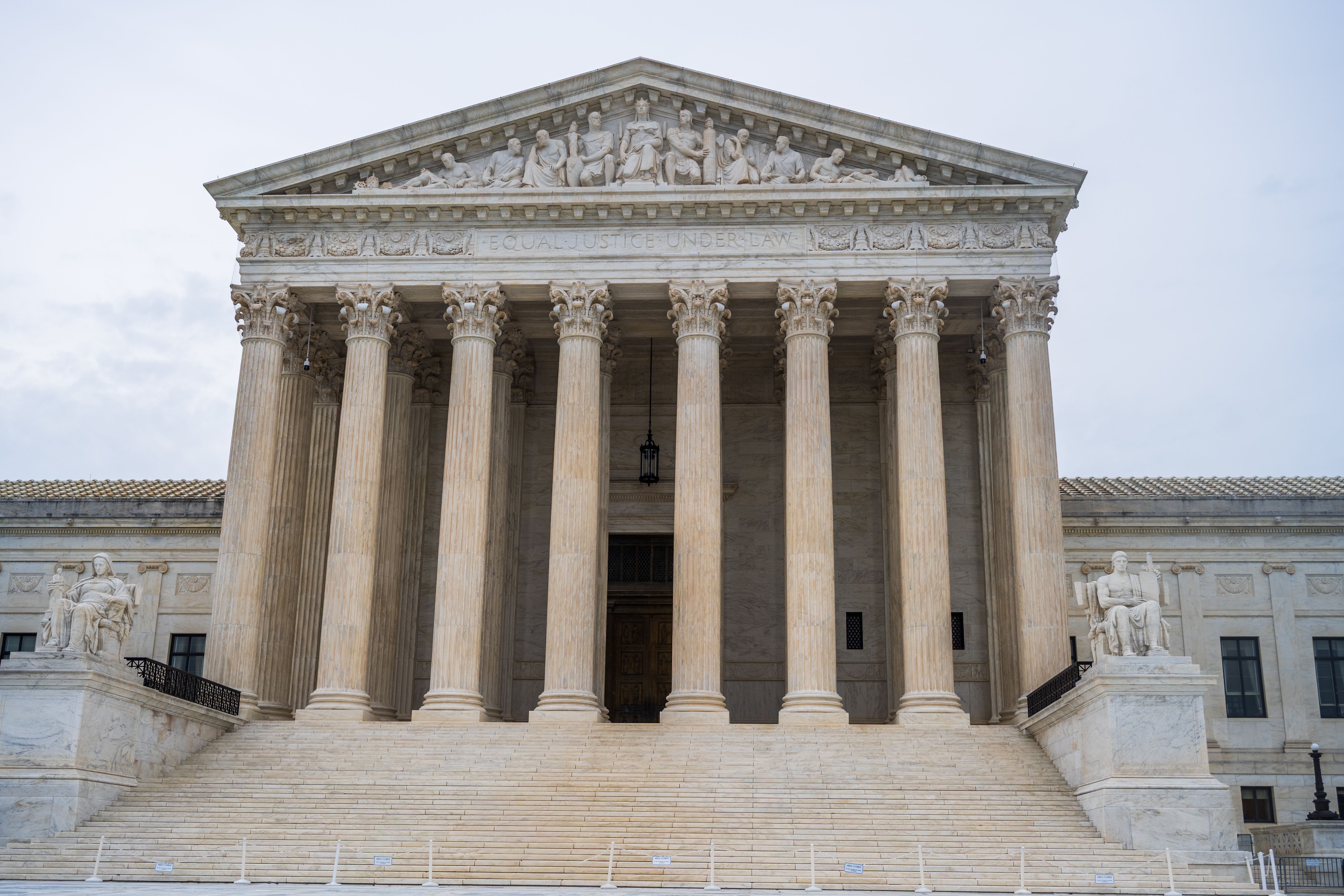 Front view of the US Supreme Court building with grand columns and classic architecture
